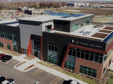 The Smart Factory @ Wichita is an experience center convened by Deloitte that marries an ecosystem of world-leading organizations with business strategy and cutting-edge technology to demonstrate Industry 4.0