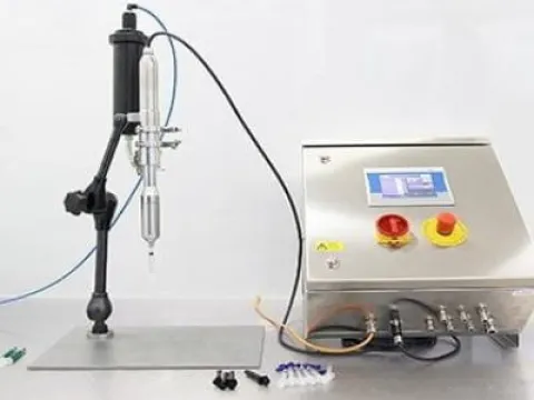 Semi-automatic benchtop dosing system for syringes with a Luer Lock attachment